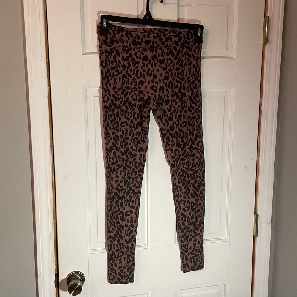 No Boundaries Leopard Print Leggings. Pair with leggings and a sweater